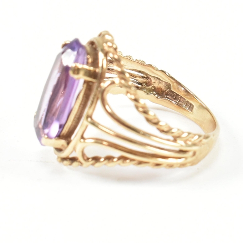 220 - A hallmarked 9ct gold and amethyst ring and a hallmarked 9ct gold and synthetic opal ring. The dress... 