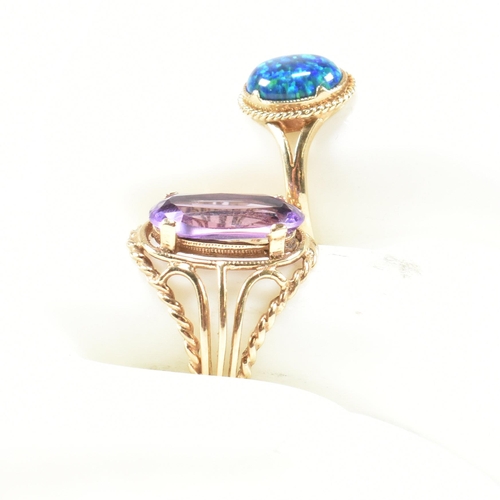 220 - A hallmarked 9ct gold and amethyst ring and a hallmarked 9ct gold and synthetic opal ring. The dress... 