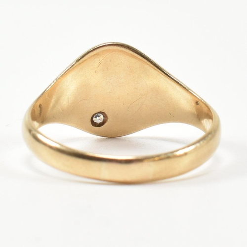 226 - A hallmarked 9ct gold and CZ signet ring. The 9ct gold signet ring having an oval face set to the to... 