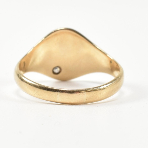 226 - A hallmarked 9ct gold and CZ signet ring. The 9ct gold signet ring having an oval face set to the to... 