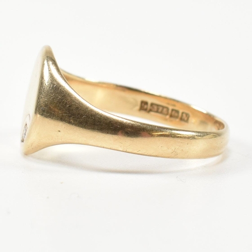 226 - A hallmarked 9ct gold and CZ signet ring. The 9ct gold signet ring having an oval face set to the to... 