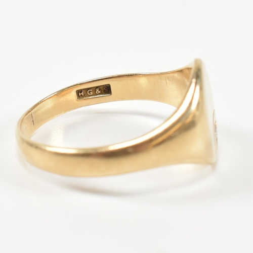 226 - A hallmarked 9ct gold and CZ signet ring. The 9ct gold signet ring having an oval face set to the to... 