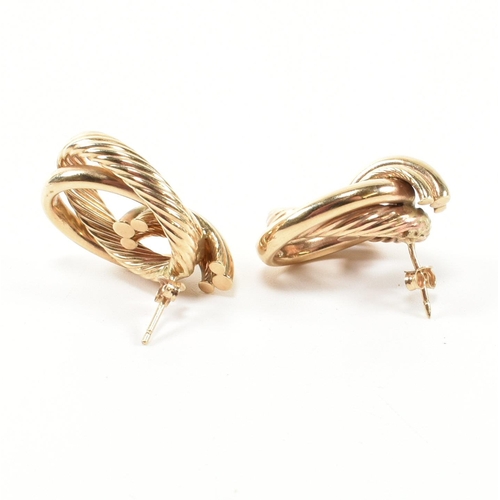 239 - A pair of hallmarked 9ct gold interlocking knot earrings. The earrings having an interlocking knot d... 