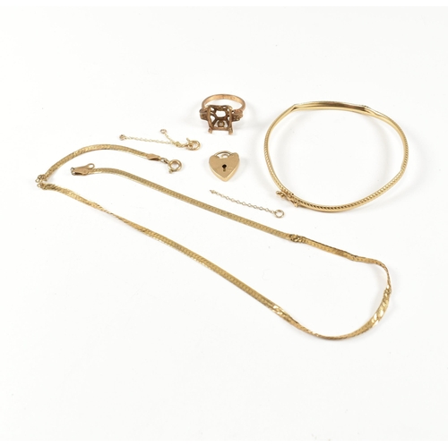 240 - A collection of 9ct gold jewellery components. The lot to include a hallmarked 9ct gold bangle, hall... 