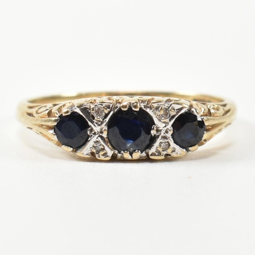 243 - A hallmarked 9ct gold, diamond and sapphire half hoop ring. The antique style ring having three grad... 