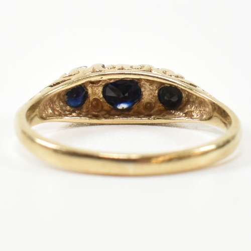 243 - A hallmarked 9ct gold, diamond and sapphire half hoop ring. The antique style ring having three grad... 