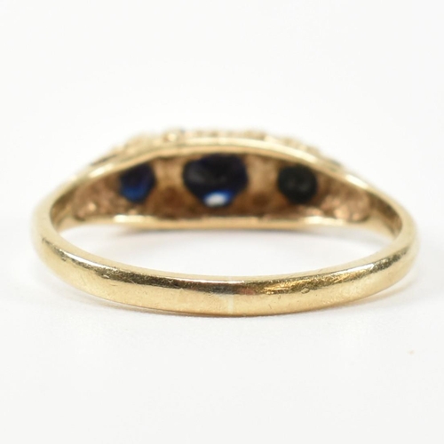 243 - A hallmarked 9ct gold, diamond and sapphire half hoop ring. The antique style ring having three grad... 