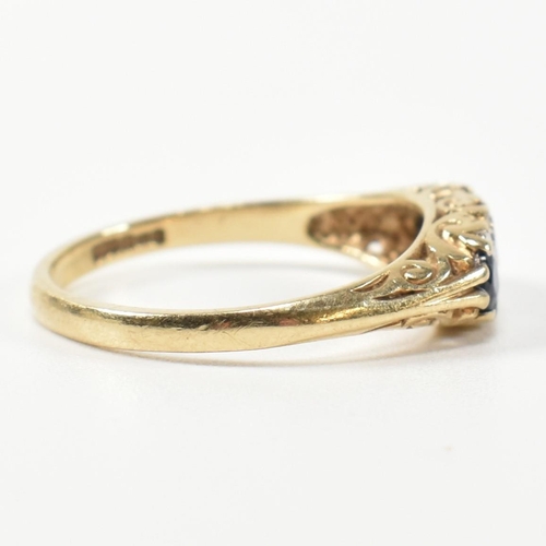 243 - A hallmarked 9ct gold, diamond and sapphire half hoop ring. The antique style ring having three grad... 