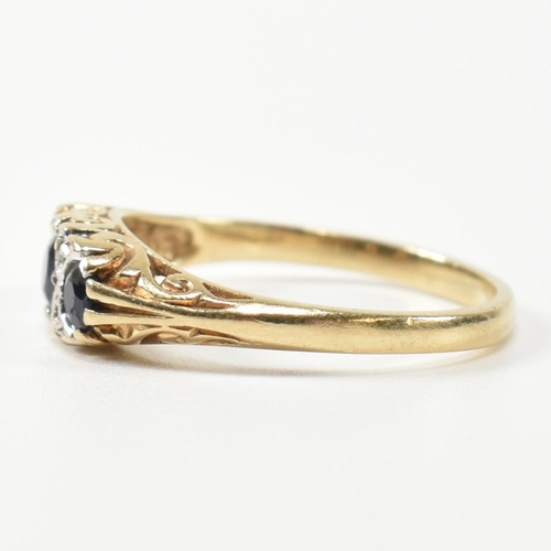 243 - A hallmarked 9ct gold, diamond and sapphire half hoop ring. The antique style ring having three grad... 