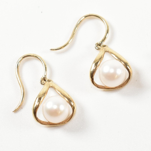 245 - Two pairs of gold and cultured pearl earrings. The earrings to include a pair of 14ct gold and cultu... 