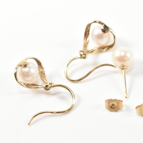 245 - Two pairs of gold and cultured pearl earrings. The earrings to include a pair of 14ct gold and cultu... 