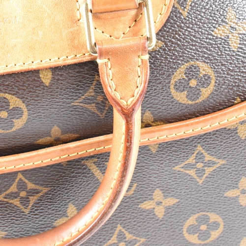 25 - A Louis Vuitton Trouville monogram handbag. The Louis Vuitton handbag/travel bag fashioned in monogr... 