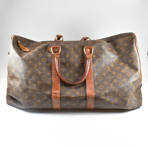 250 - A Louis Vuitton Keepall Bandouliere 55 monogram travel bag. The large travel bag fashioned in monogr... 