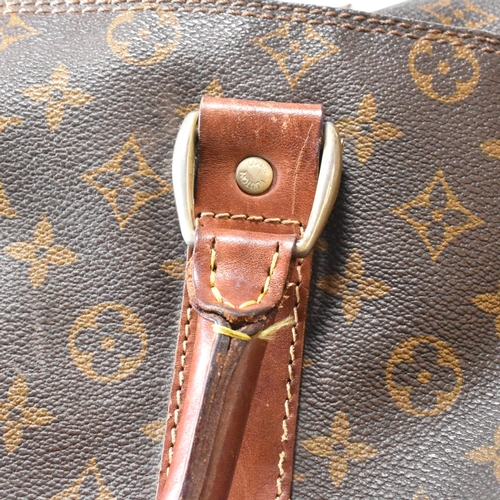 250 - A Louis Vuitton Keepall Bandouliere 55 monogram travel bag. The large travel bag fashioned in monogr... 