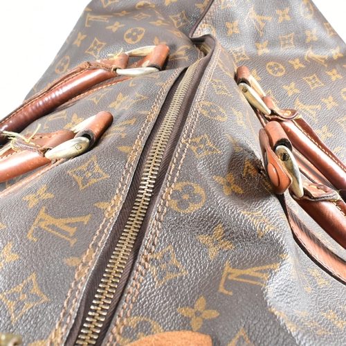 250 - A Louis Vuitton Keepall Bandouliere 55 monogram travel bag. The large travel bag fashioned in monogr... 