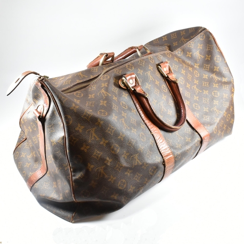 250 - A Louis Vuitton Keepall Bandouliere 55 monogram travel bag. The large travel bag fashioned in monogr... 