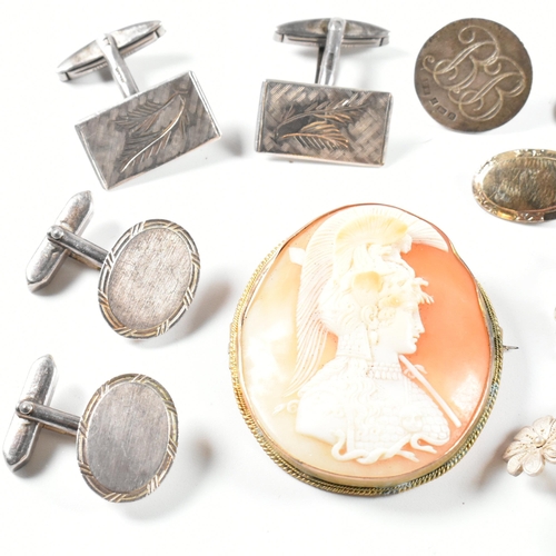 255 - A collection of silver jewellery including a cameo brooch pin. The jewellery to include a hallmarked... 