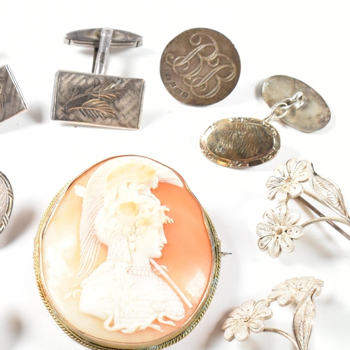 255 - A collection of silver jewellery including a cameo brooch pin. The jewellery to include a hallmarked... 