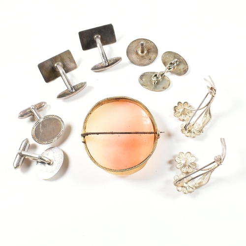 255 - A collection of silver jewellery including a cameo brooch pin. The jewellery to include a hallmarked... 