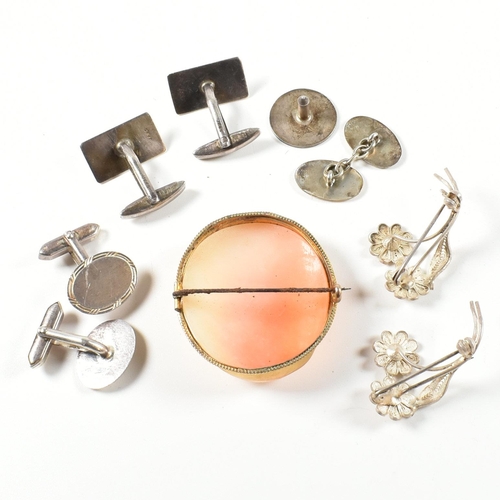 255 - A collection of silver jewellery including a cameo brooch pin. The jewellery to include a hallmarked... 