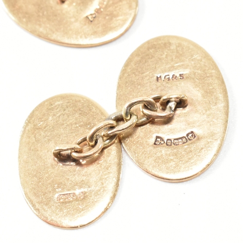 256 - A pair of 9ct gold cufflinks and a pair of 9ct gold on silver cufflinks. The lot to include a pair o... 