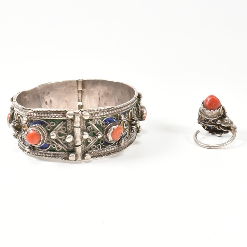 259 - An African Berber Kabyle silver, coral and enamel bangle and earring/ring. The traditional Kabyle si... 