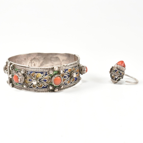 259 - An African Berber Kabyle silver, coral and enamel bangle and earring/ring. The traditional Kabyle si... 