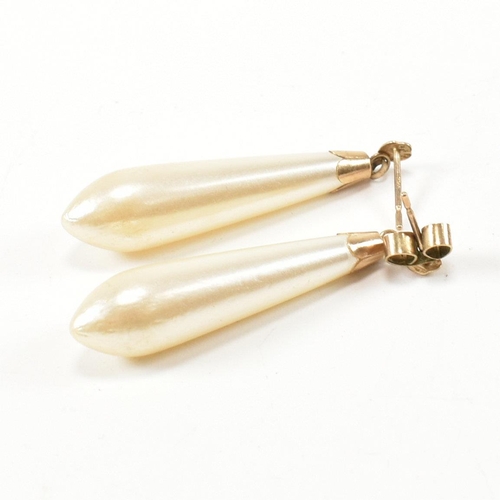 260 - A 9ct rolled gold hinged bracelet and a pair of 9ct gold and simulated pearl pendant earrings. The 9... 