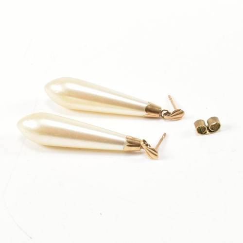 260 - A 9ct rolled gold hinged bracelet and a pair of 9ct gold and simulated pearl pendant earrings. The 9... 