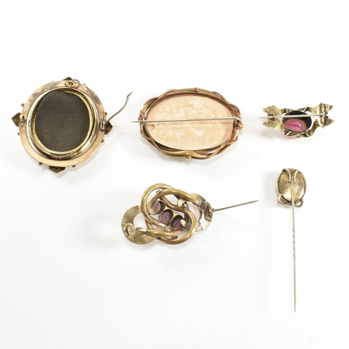 262 - A collection of 19th century brooch pins. The brooches to include enamelled panel depicting maiden a... 