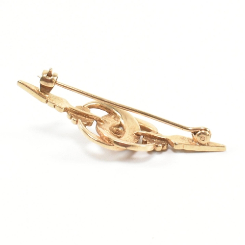 266 - A hallmarked 9ct gold, sapphire, diamond and seed pearl brooch pin. The brooch pin having a central ... 