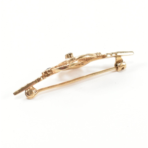 266 - A hallmarked 9ct gold, sapphire, diamond and seed pearl brooch pin. The brooch pin having a central ... 