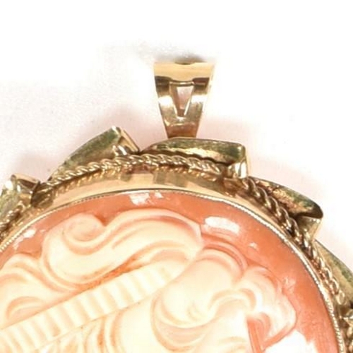 271 - A hallmarked 9ct gold shell cameo brooch pin. The oval shell cameo being carved with the profile of ... 