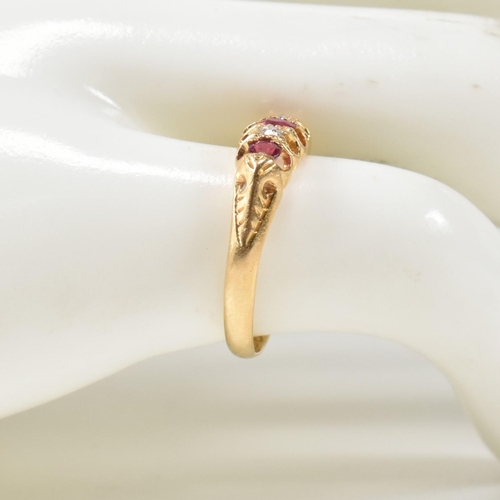 272 - An early 20th century hallmarked 18ct gold, ruby and diamond gypsy ring. The ring having a central o... 