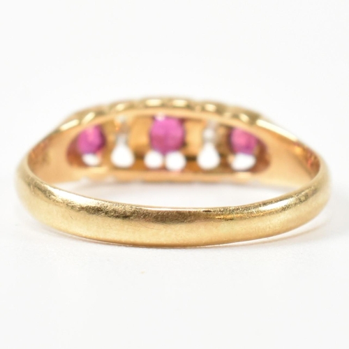 272 - An early 20th century hallmarked 18ct gold, ruby and diamond gypsy ring. The ring having a central o... 