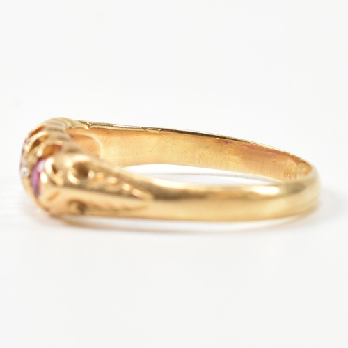 272 - An early 20th century hallmarked 18ct gold, ruby and diamond gypsy ring. The ring having a central o... 