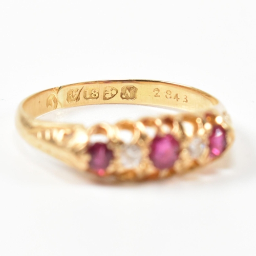 272 - An early 20th century hallmarked 18ct gold, ruby and diamond gypsy ring. The ring having a central o... 