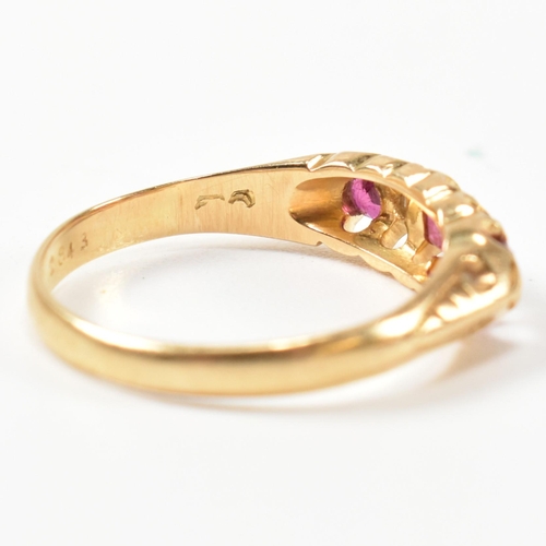 272 - An early 20th century hallmarked 18ct gold, ruby and diamond gypsy ring. The ring having a central o... 