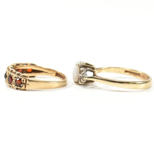 274 - Two hallmarked gold and gem set rings. The rings to include a hallmarked 9ct gold, opal and CZ ring,... 