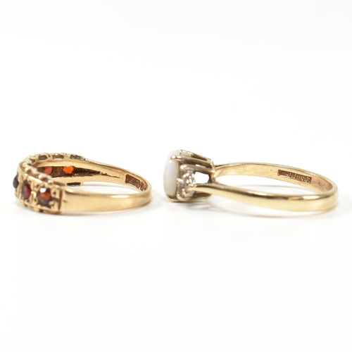 274 - Two hallmarked gold and gem set rings. The rings to include a hallmarked 9ct gold, opal and CZ ring,... 