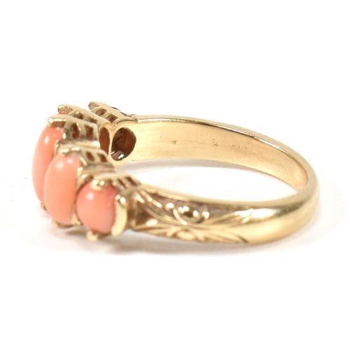 276 - A hallmarked 9ct gold and coral five stone ring. The ring set with five oval opal cabochons to a tex... 