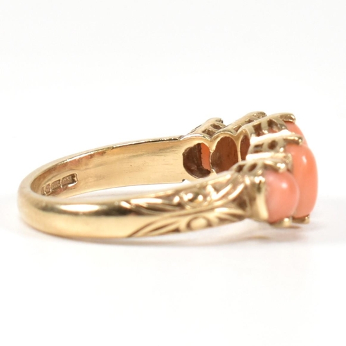 276 - A hallmarked 9ct gold and coral five stone ring. The ring set with five oval opal cabochons to a tex... 