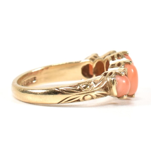 276 - A hallmarked 9ct gold and coral five stone ring. The ring set with five oval opal cabochons to a tex... 