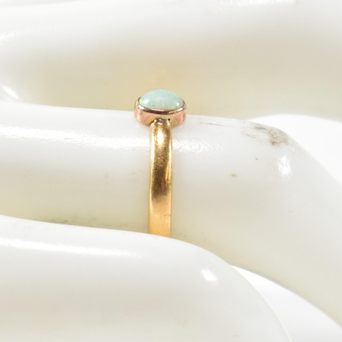 278 - A Victorian hallmarked 22ct gold and opal ring. The ring having a single oval cut opal cabochon with... 