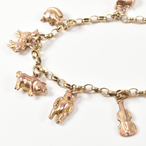 280 - A hallmarked 9ct gold charm bracelet. The 9ct gold charm bracelet having eight hallmarked 9ct gold c... 