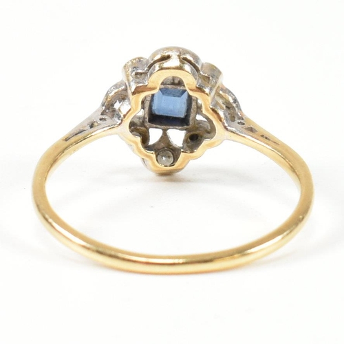 29 - A 1920S 18ct gold sapphire and diamond cluster ring. The ring set with a central sapphire with singl... 