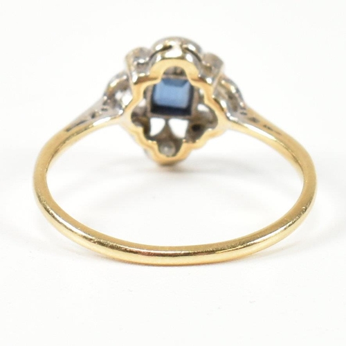 29 - A 1920S 18ct gold sapphire and diamond cluster ring. The ring set with a central sapphire with singl... 