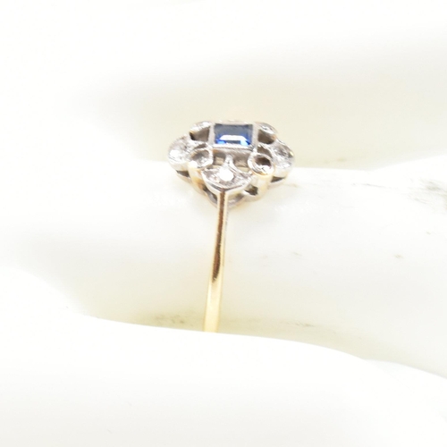 29 - A 1920S 18ct gold sapphire and diamond cluster ring. The ring set with a central sapphire with singl... 