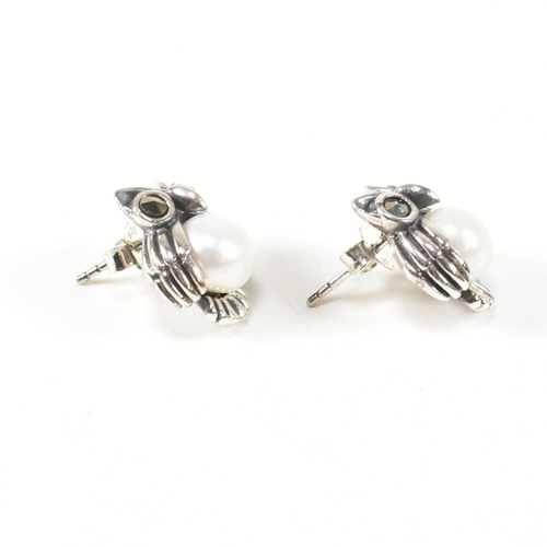 293 - A pair of 925 silver pearl and marcasite novelty earrings in the form of an owl. Heads measures 17mm... 