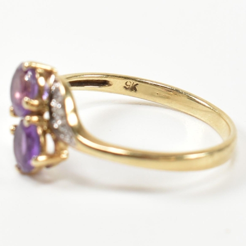 302 - A hallmarked 9ct gold, amethyst and diamond cross over ring. The ring having two round cut amethysts... 